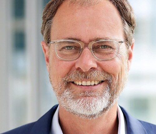 " All Machines Must Speak the Same Language"